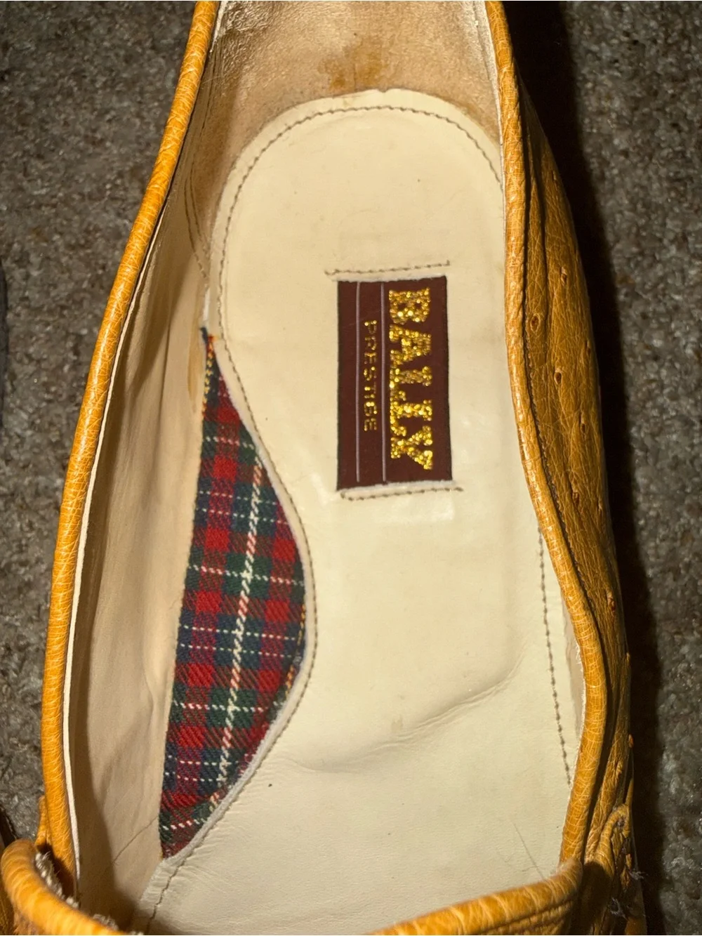 Bally of Switzerland genuine ostrich leather dress loafers.